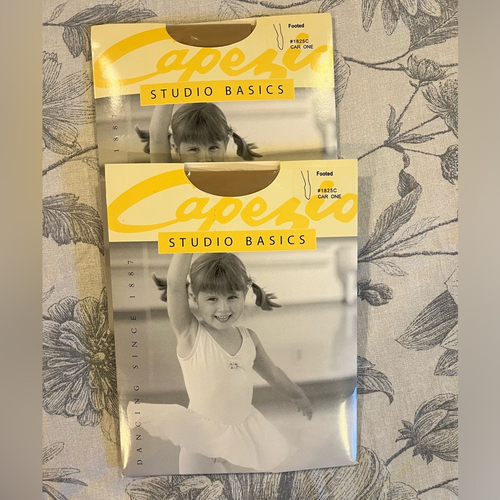 2 packs of Capezio brand studio basics footed tights in caramel size child 8-12